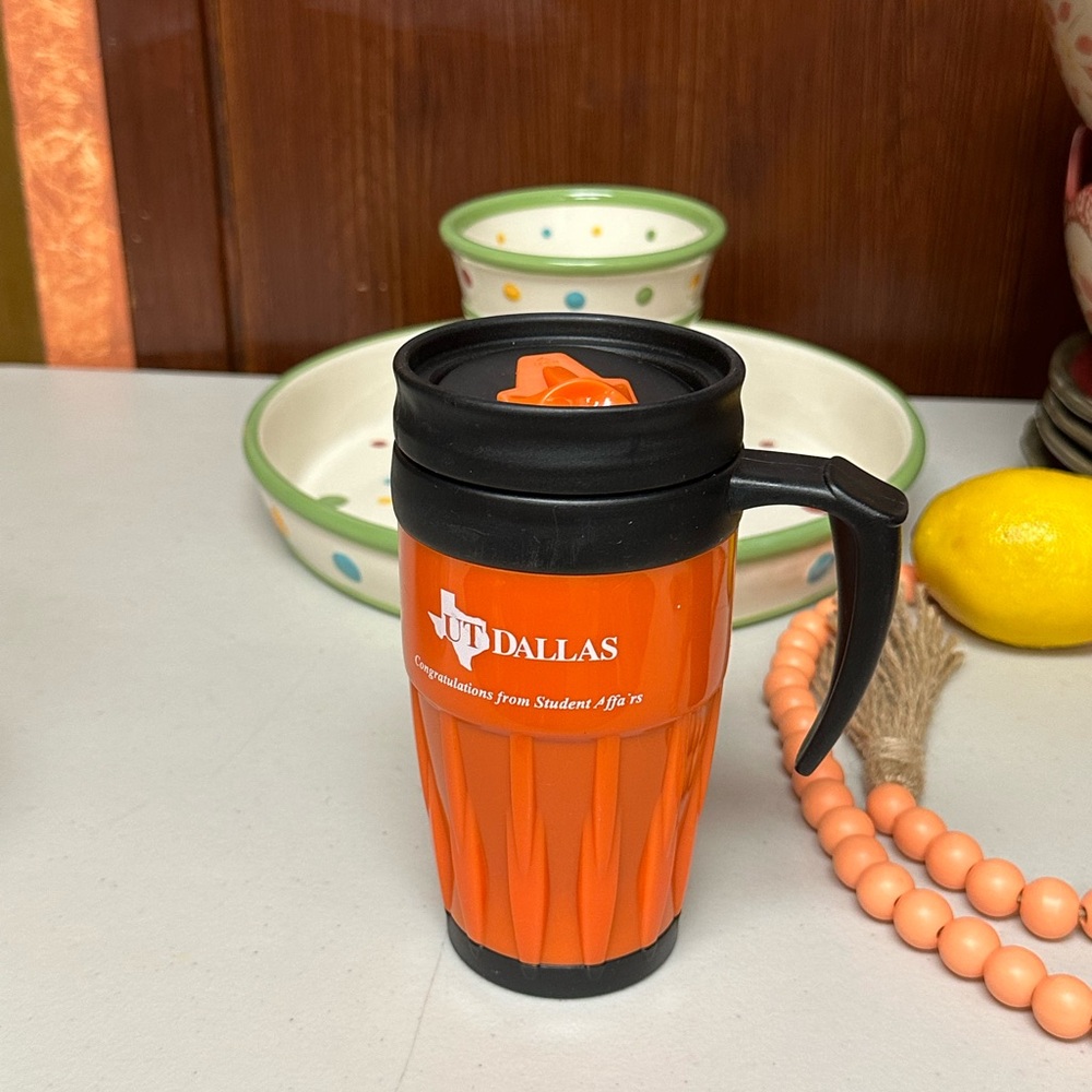 Orange Travel Mug with logo UT Dallas